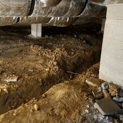 Open trench in unsealed crawl space | Crawl Space Waterproofing | Area Waterproofing 